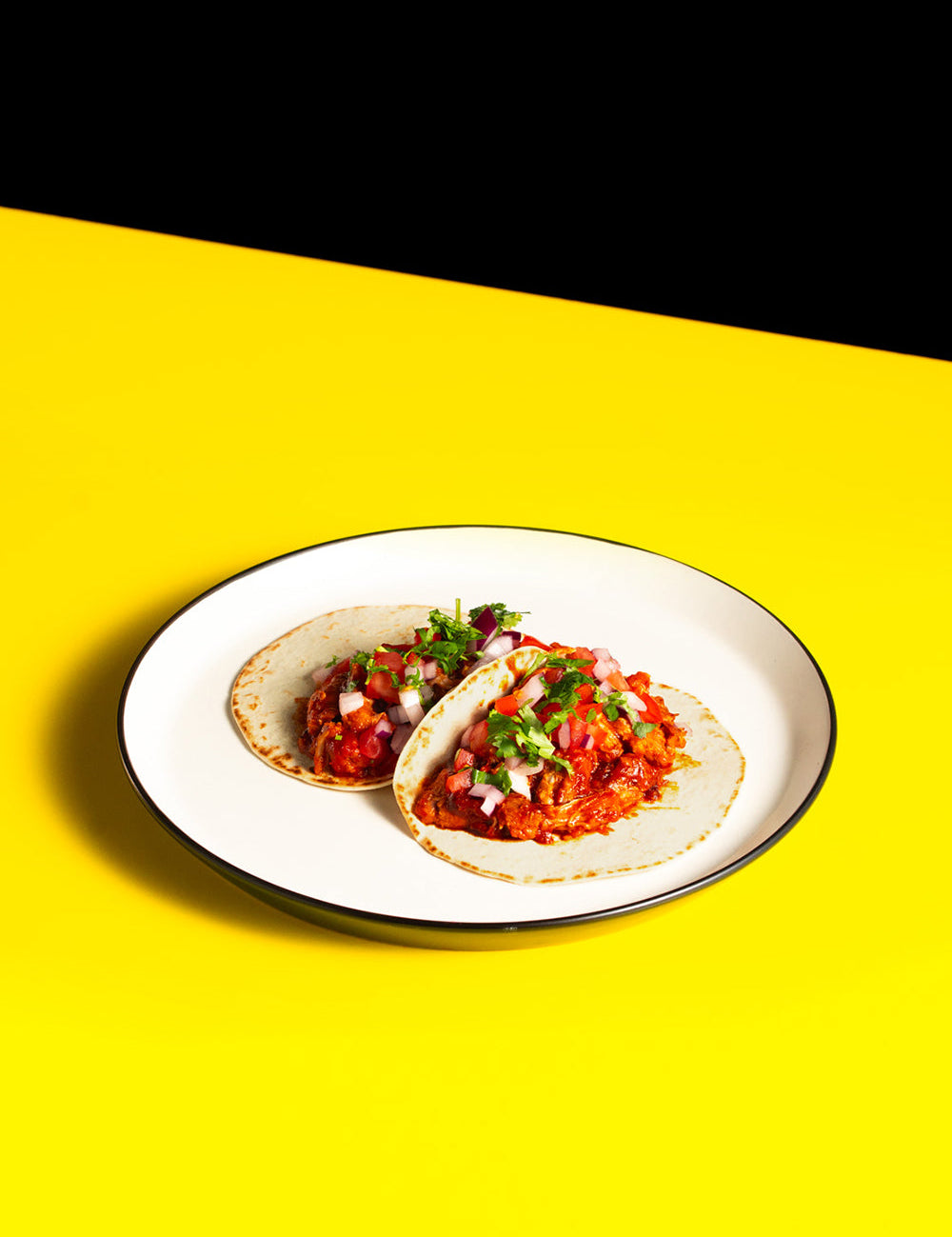 Pulled Pork and coriander soft taco with pico de gallo