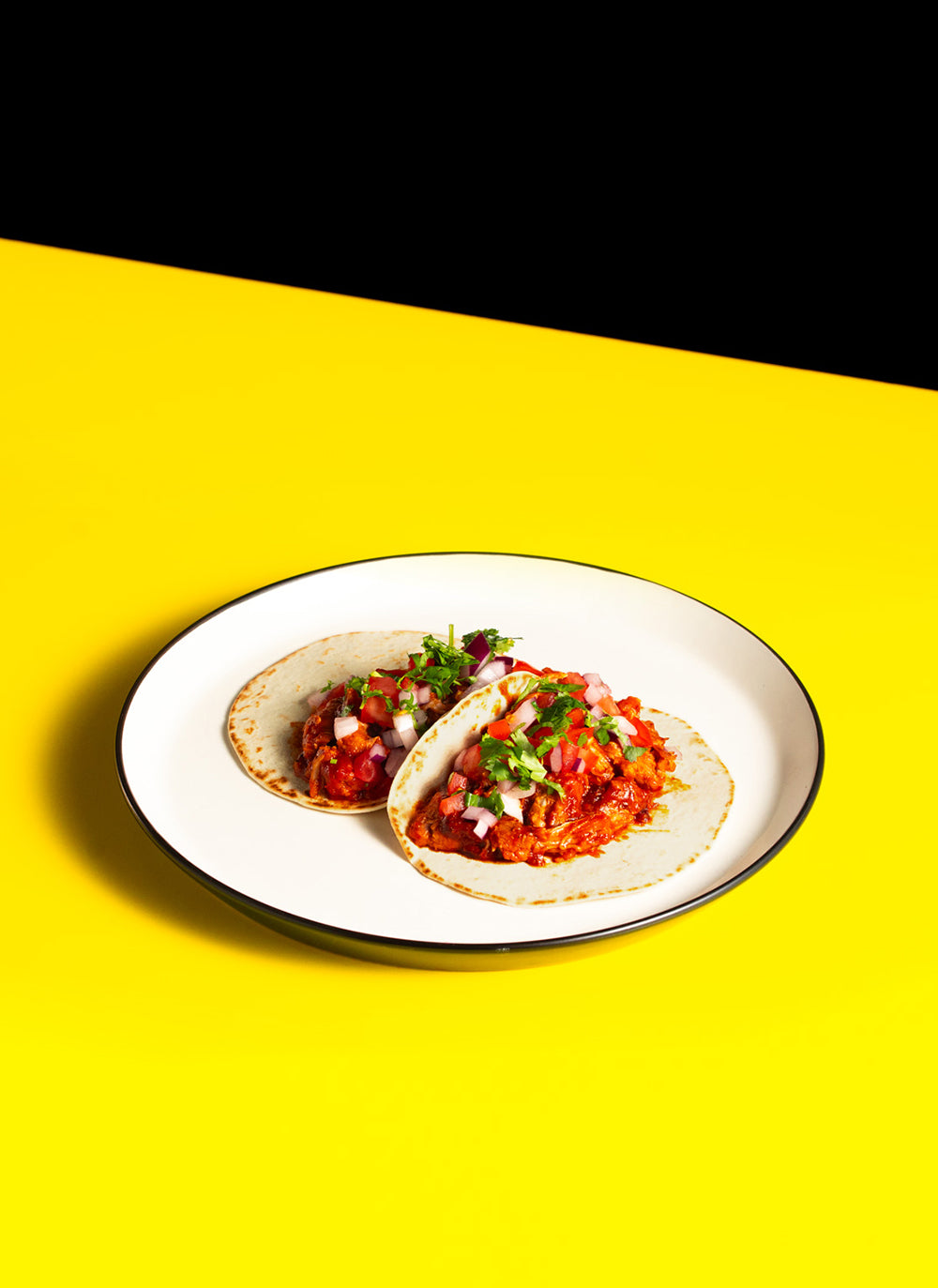 Pulled Pork and coriander soft taco with pico de gallo